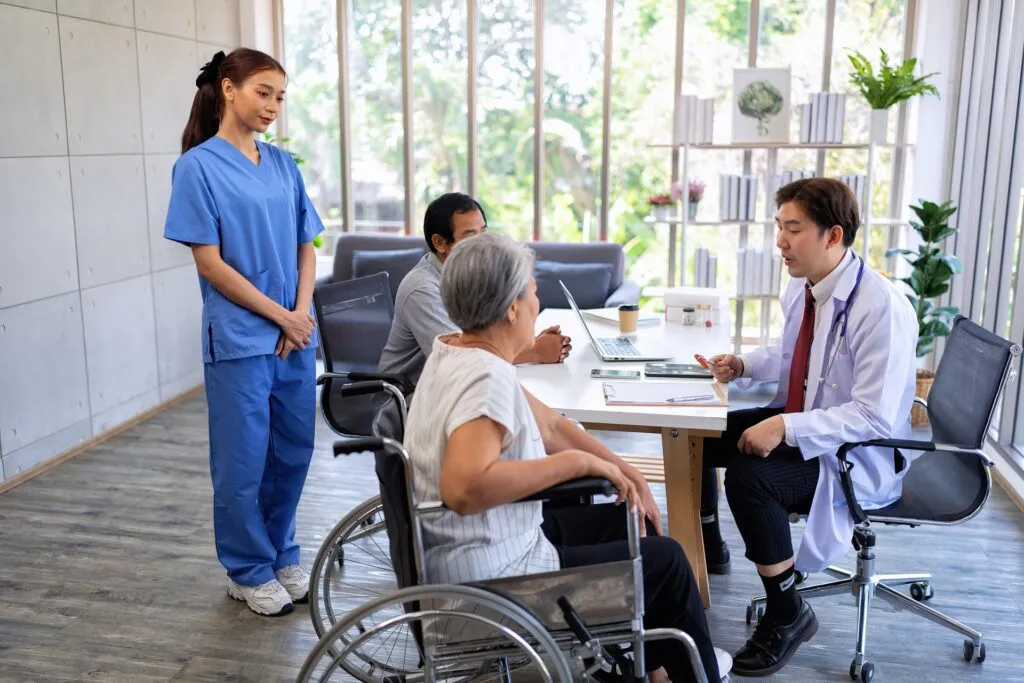 senior couple male on wheel chair having consultat 2023 11 27 05 02 36 utc